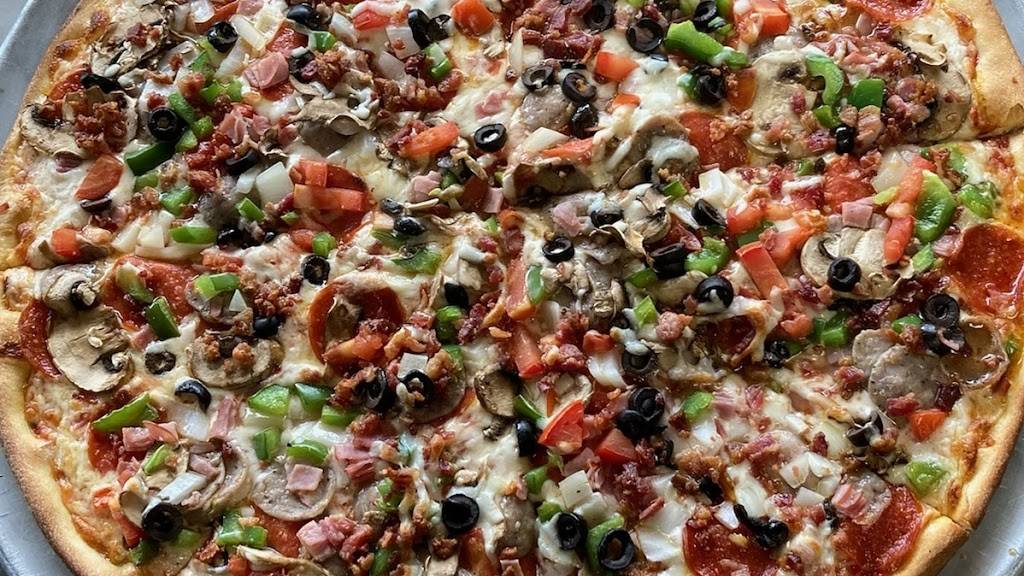 Dominics Pizza | restaurant | 2772 Elkcam Blvd, Deltona, FL 32738, USA | 3862186508 OR +1 386-218-6508