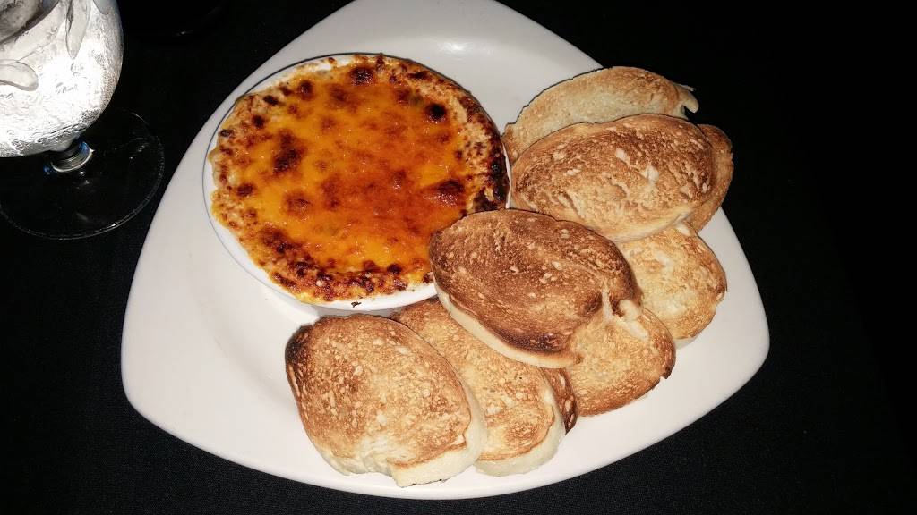 Dégagé Jazz Café | restaurant | 301 River Rd, Maumee, OH 43537, USA | 4197948205 OR +1 419-794-8205