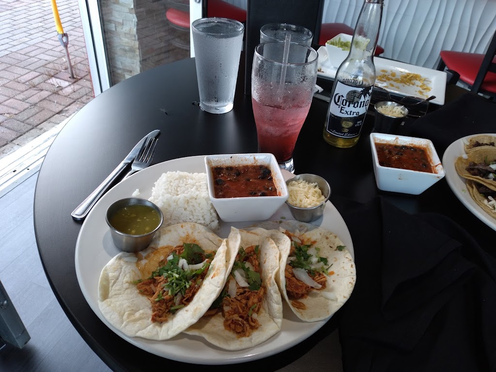 Caliente Latin Kitchen & Rum Bar | restaurant | 5108 W Bluemound Rd, Milwaukee, WI 53208, USA | 4147639447 OR +1 414-763-9447