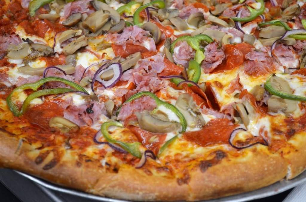 Mr.Es Pizza | restaurant | 46 W Lake St, Sand Lake, MI 49343, USA | 6165573060 OR +1 616-557-3060
