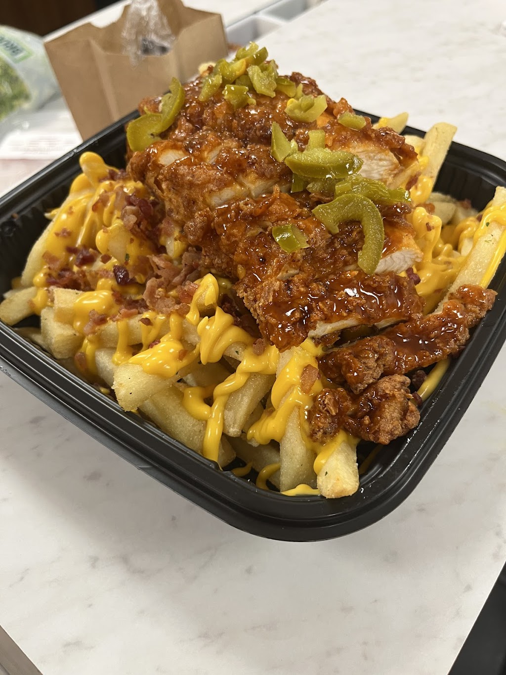 Tickle Yo Soul | restaurant | Located inside The Stuffed Hub, 21477 Bridge St Suite E, Southfield, MI 48033, USA | 2484694405 OR +1 248-469-4405