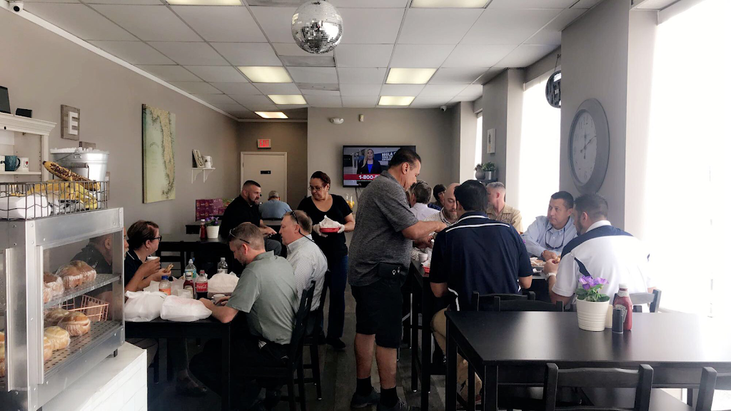 Caribbean Cafe and Resturant | restaurant | 105 US-301 #126, Tampa, FL 33619, USA | 8133922118 OR +1 813-392-2118