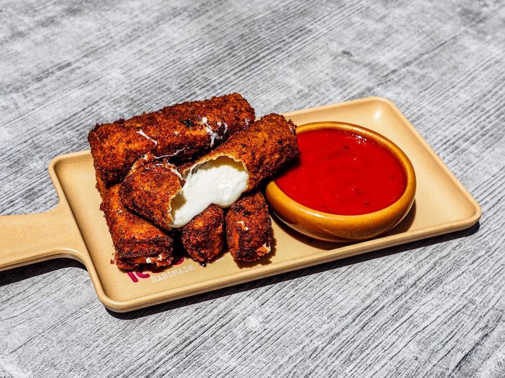 Roots Handmade Pizza - South Loop | restaurant | 744 S Dearborn St, Chicago, IL 60605, USA | 7736454909 OR +1 773-645-4909