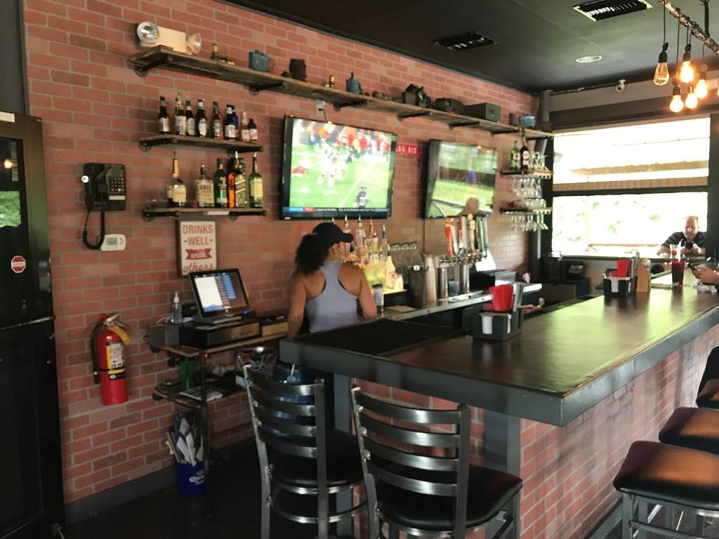 Boots n Badges | restaurant | 9847 E Adamo Dr, Tampa, FL 33619, USA | 8134436060 OR +1 813-443-6060