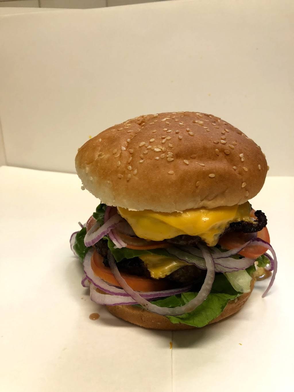 Marios Pizza | restaurant | 14929 Guy R Brewer Blvd, Jamaica, NY 11434, USA | 7186563104 OR +1 718-656-3104