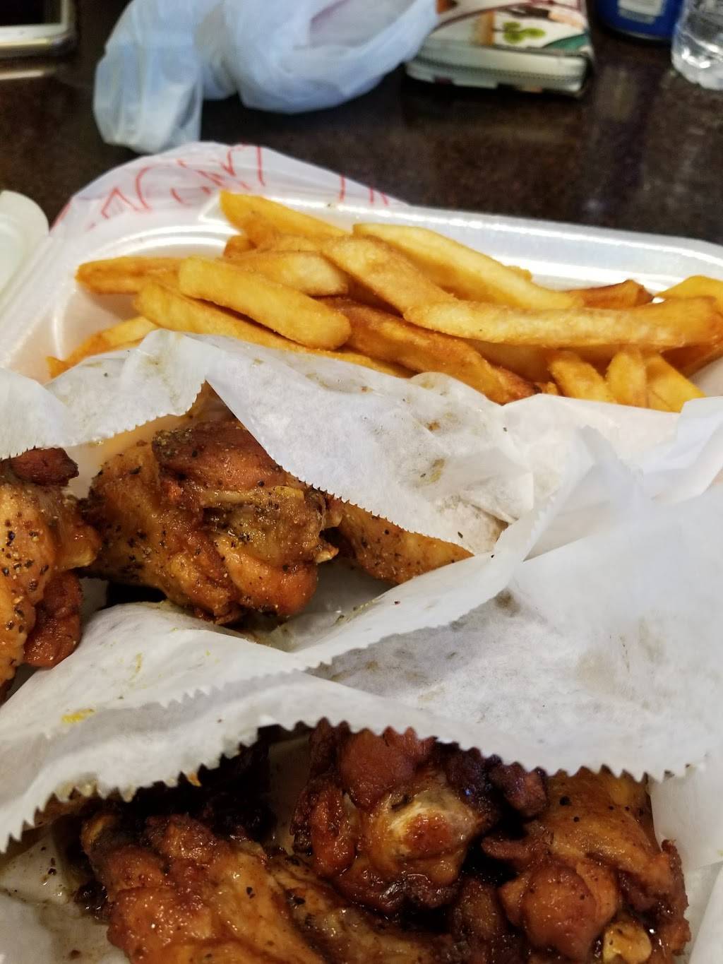 Chicago Wings Around the World | restaurant | 557 E 75th St, Chicago, IL 60619, USA | 7739524795 OR +1 773-952-4795