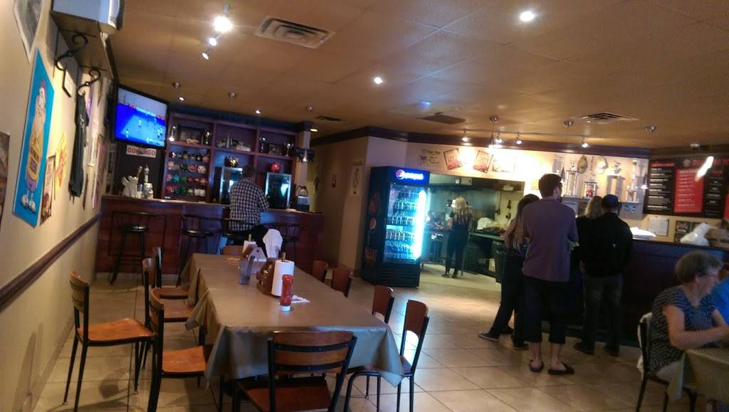 Big Bone BBQ and Wicked Wings | restaurant | 190 Minets Point Rd, Barrie, ON L4N 4C3, Canada | 7057332663 OR +1 705-733-2663