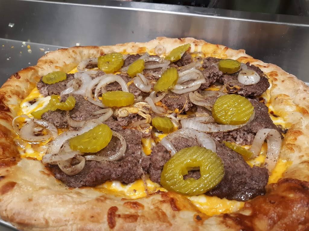 Russos Pizza | restaurant | Chateau Center, 1760 44th St SW, Wyoming, MI 49519, USA | 6165303200 OR +1 616-530-3200