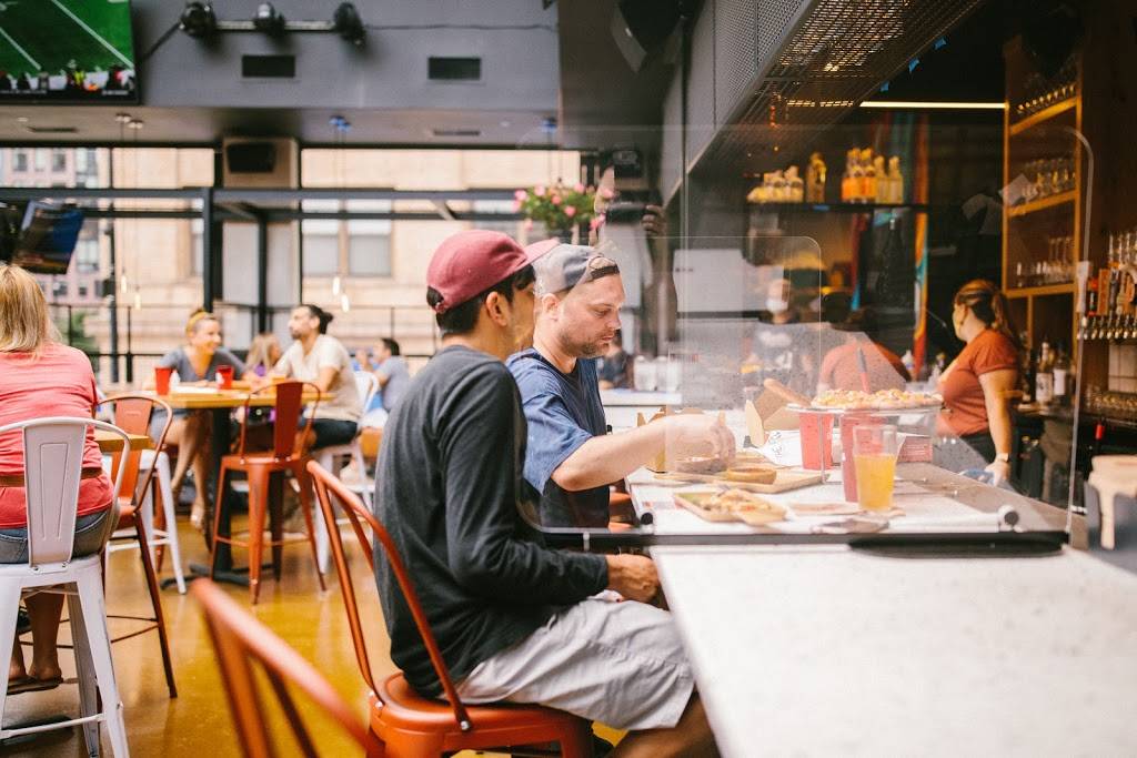 Roots Handmade Pizza - South Loop | restaurant | 744 S Dearborn St, Chicago, IL 60605, USA | 7736454909 OR +1 773-645-4909