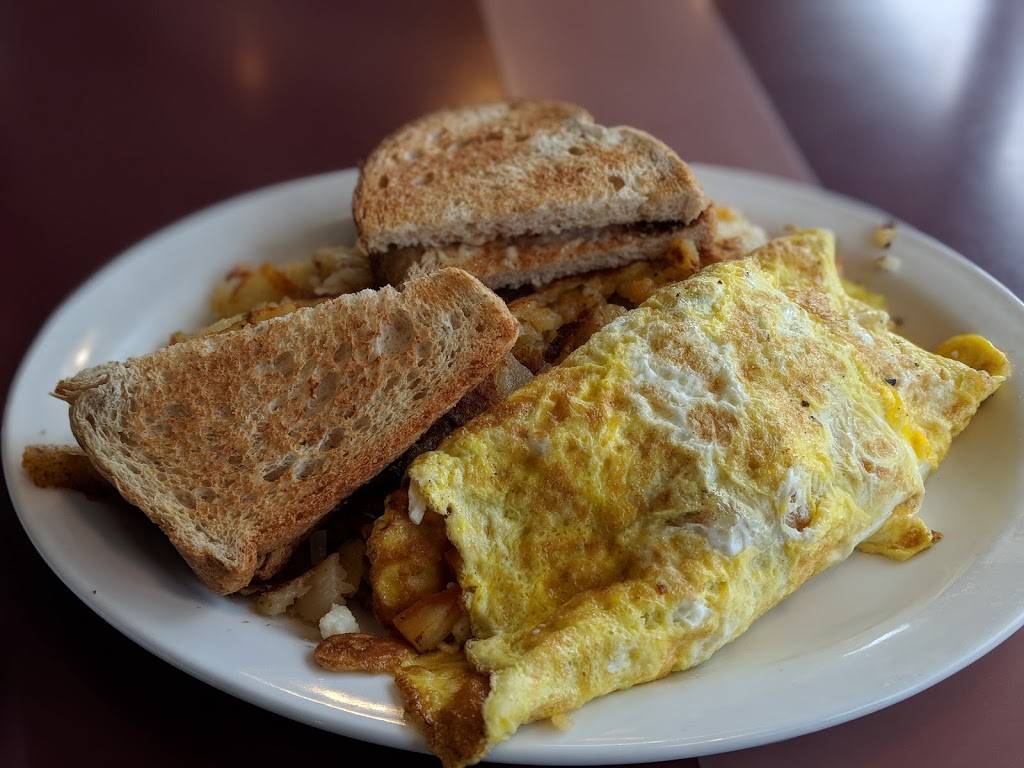 Slices Family Restaurant | restaurant | 300 King St W, Kitchener, ON N2G 1B7, Canada | 5195763760 OR +1 519-576-3760