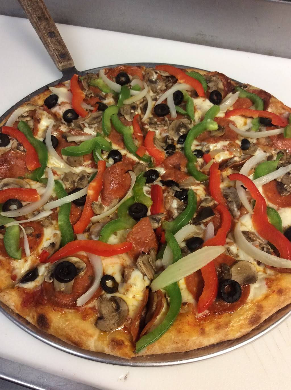 Raffallos pizza | meal delivery | 4874 Santa Monica Blvd, Los Angeles, CA 90029, USA | 3236608506 OR +1 323-660-8506