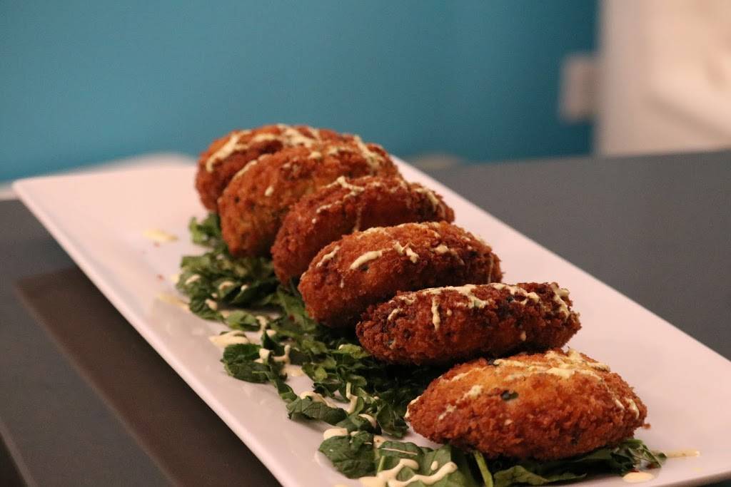 South Beach Bar and Grill | restaurant | 476 Main St, East Orange, NJ 07018, USA | 9736731100 OR +1 973-673-1100