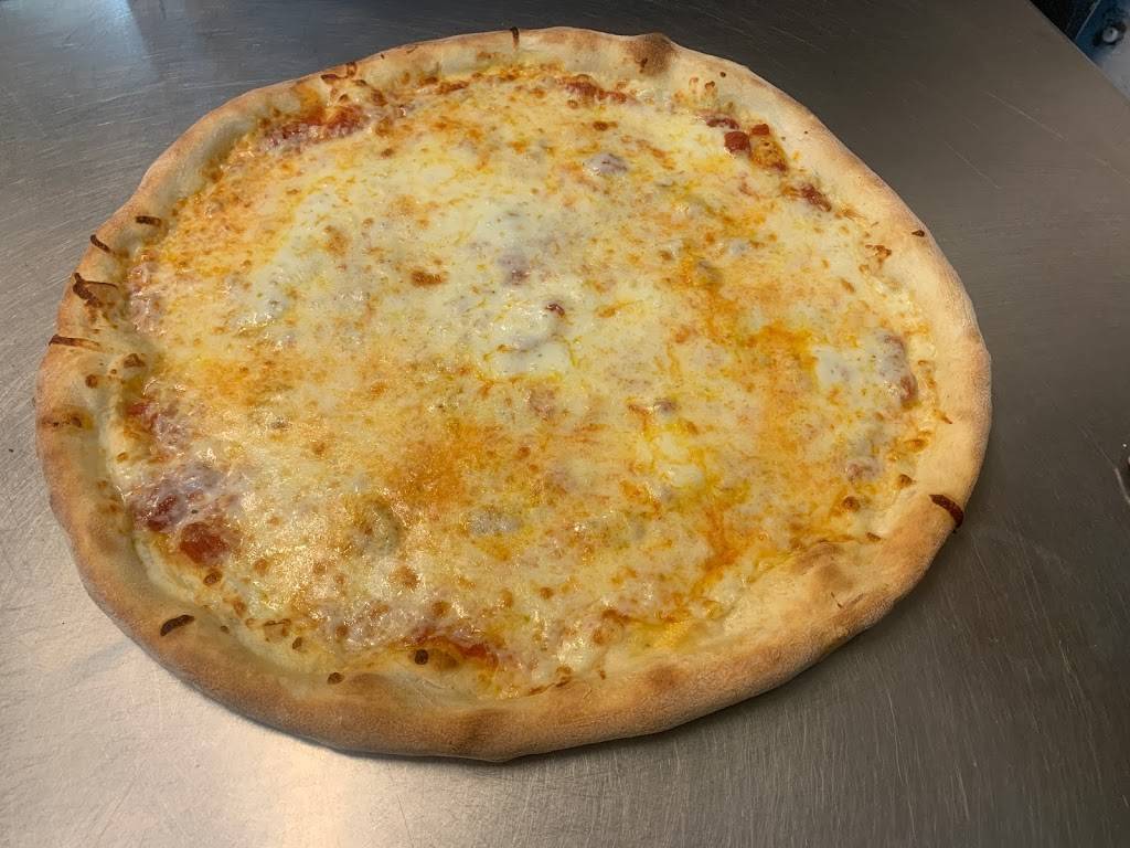 Famous Pizza & Wings | restaurant | 12748 FL-535, Orlando, FL 32821, USA | 4072394000 OR +1 407-239-4000