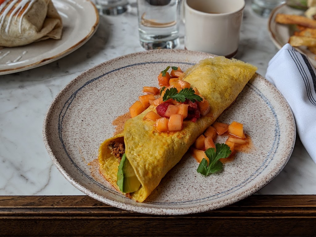 Uncle Wolfies Breakfast Tavern | restaurant | 234 E Vine St, Milwaukee, WI 53212, USA | 4147633021 OR +1 414-763-3021