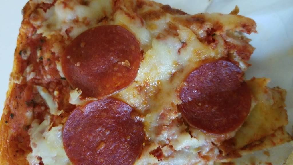 Ginos Famous Pizza | restaurant | 1656 Nash Rd, Courtice, ON L1E 2Y4, Canada | 9054344333 OR +1 905-434-4333