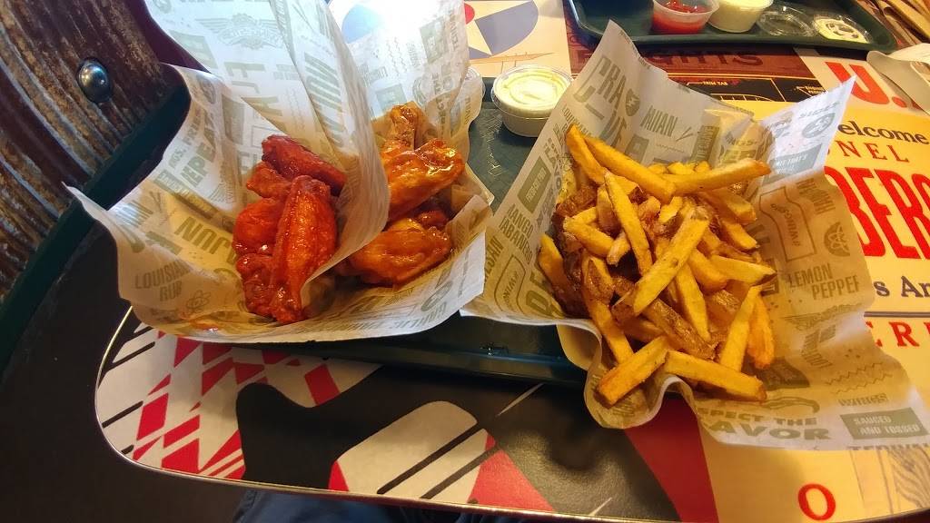 Wingstop | restaurant | 6909 La Tijera Blvd, Los Angeles, CA 90045, USA | 3106709464 OR +1 310-670-9464