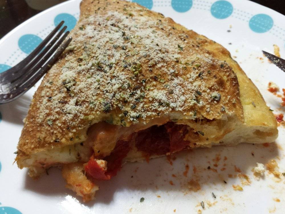 Pizza Trokadero | meal delivery | 7 Municipal St, Guelph, ON N1G 1G8, Canada | 5198292444 OR +1 519-829-2444