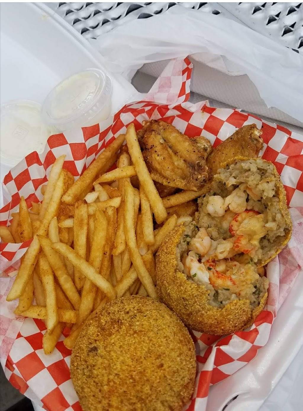 We Got Wings & More | restaurant | 10012 Tidwell Rd, Houston, TX 77078, USA | 2817488362 OR +1 281-748-8362