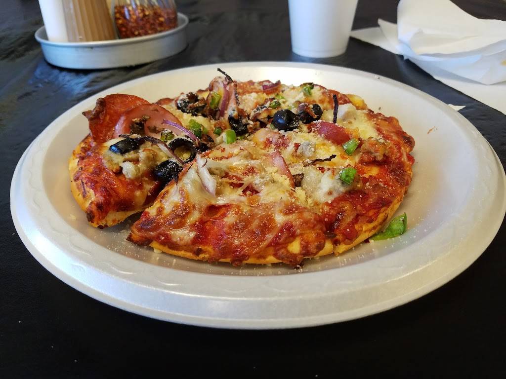 Neighborhood Pizza Cafe | restaurant | 3550 N Glenstone Ave, Springfield, MO 65803, USA | 4178334411 OR +1 417-833-4411