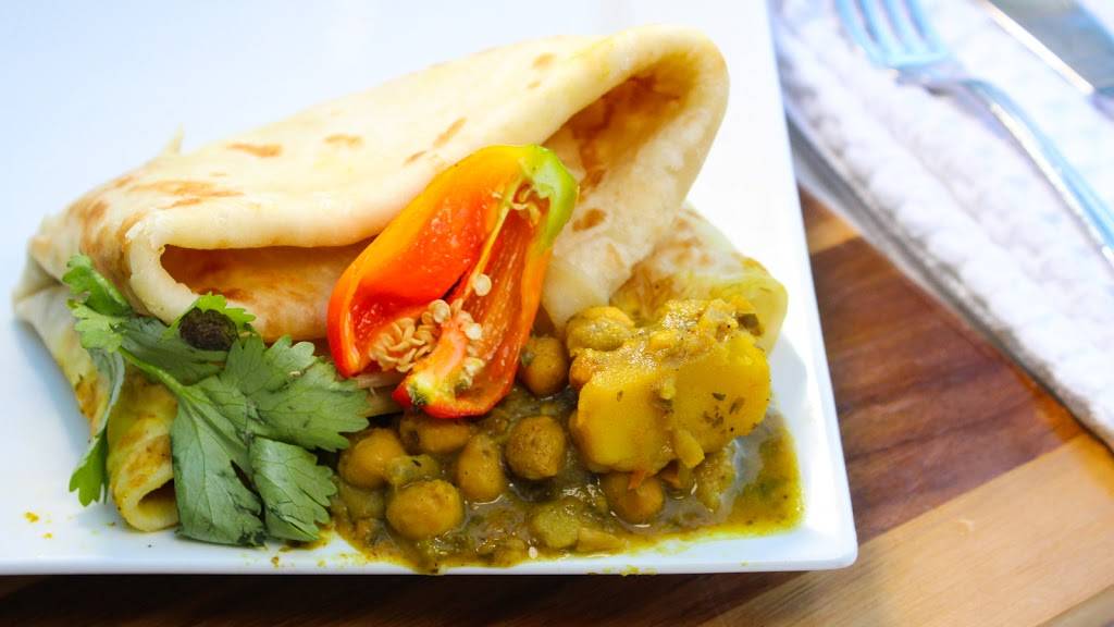 Lenas Roti & Doubles | restaurant | 6990 Financial Dr, Mississauga, ON L5N 8J4, Canada | 9058214000 OR +1 905-821-4000