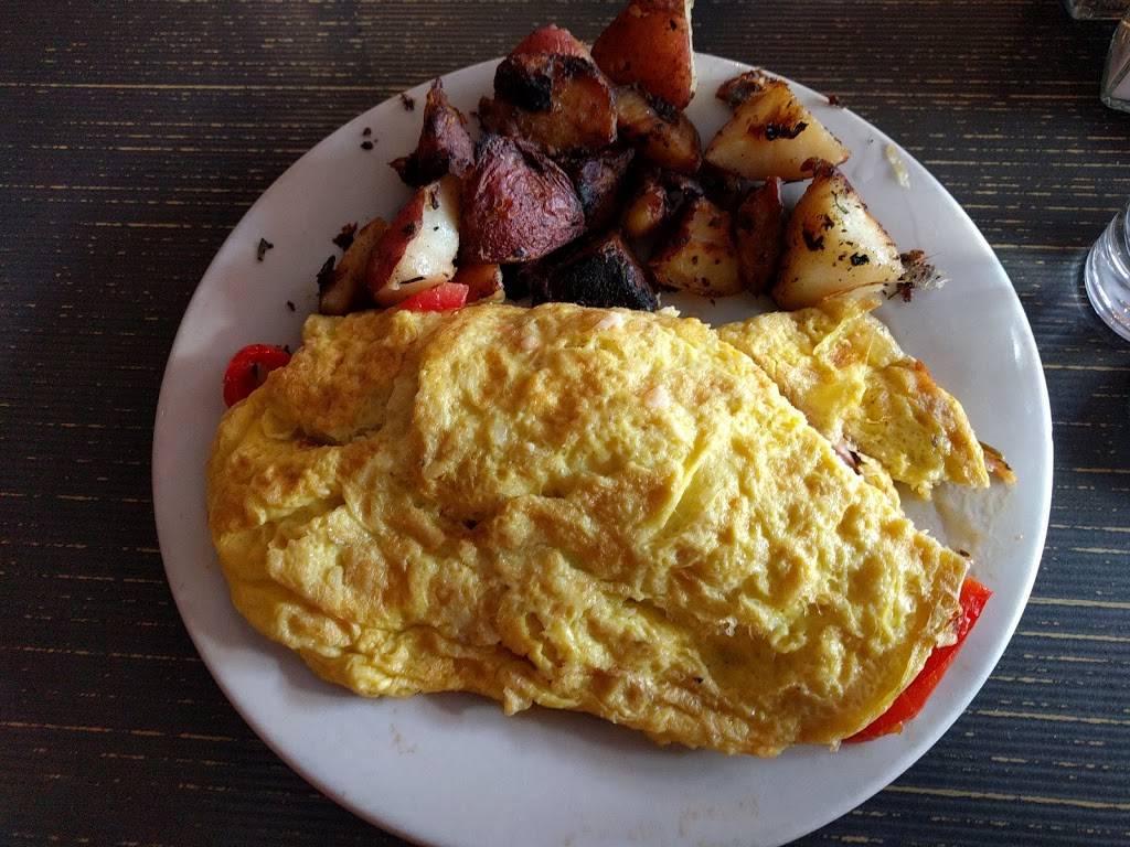 Café Zola | restaurant | 112 W Washington St, Ann Arbor, MI 48104, USA | 7347692020 OR +1 734-769-2020