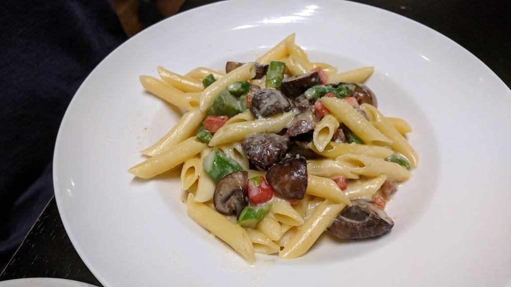 Corrados Restaurant & Bar | restaurant | 38 Baldwin St, Whitby, ON L1M 1A2, Canada | 9056553100 OR +1 905-655-3100