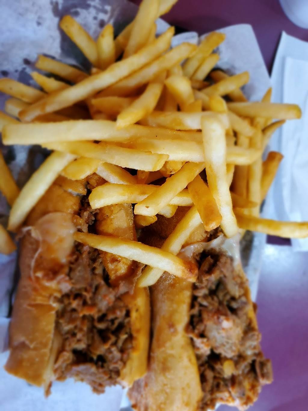 Famous Philly Cheese Steak & Wings | restaurant | 2200 Oneida St, Denver, CO 80207, USA | 3033335600 OR +1 303-333-5600