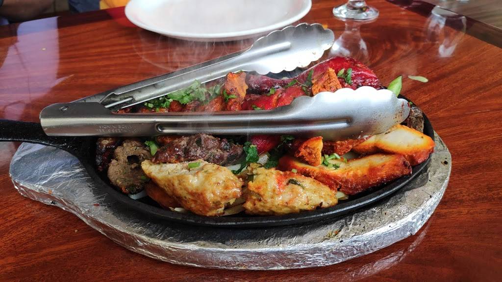 Aladdin Sweets & Cafe | restaurant | 11945 Conant St, Hamtramck, MI 48212, USA | 3138918050 OR +1 313-891-8050