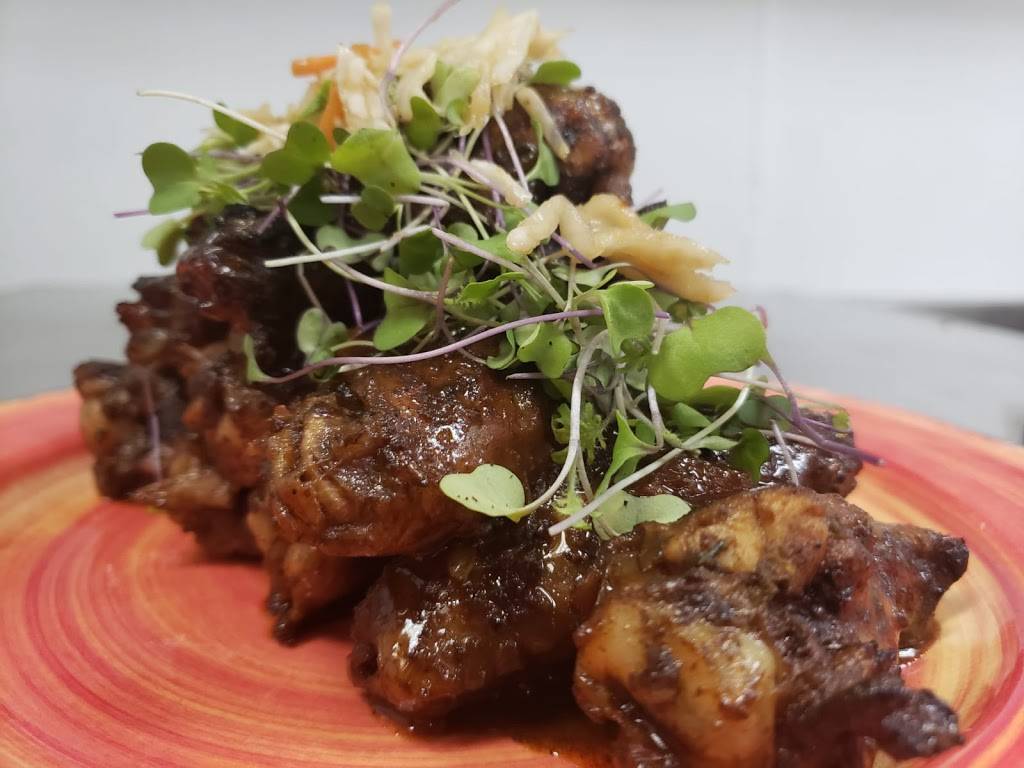 Justins Caribbean Fusion Restaurant | restaurant | 6700 Conroy Rd Ste 120, Orlando, FL 32835, USA | 4078660270 OR +1 407-866-0270