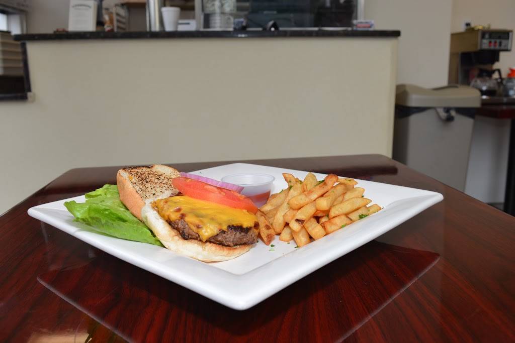 Champions Chicken & Pizza Restaurant | restaurant | 457 Main St, City of Orange, NJ 07050, USA | 9736772220 OR +1 973-677-2220