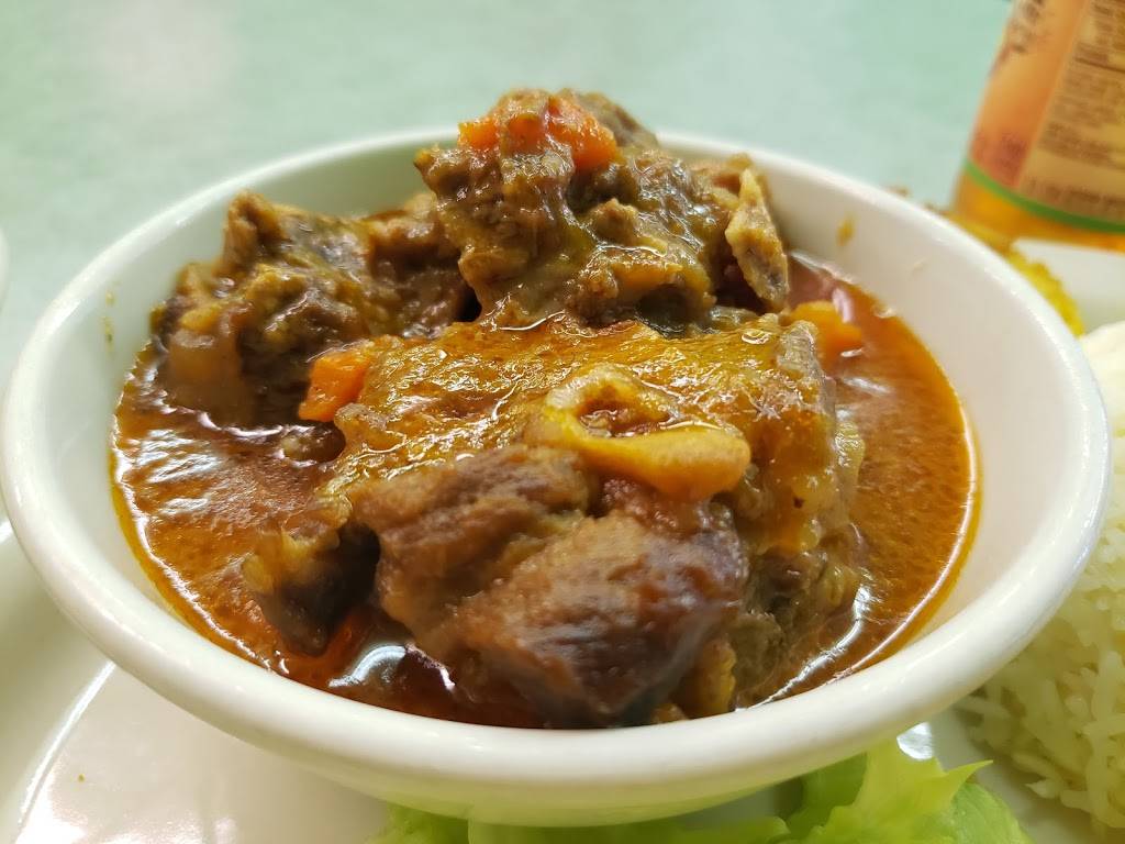 Caribbean Cafe | restaurant | 317 W Woodlawn Ave, Louisville, KY 40214, USA | 5024347711 OR +1 502-434-7711