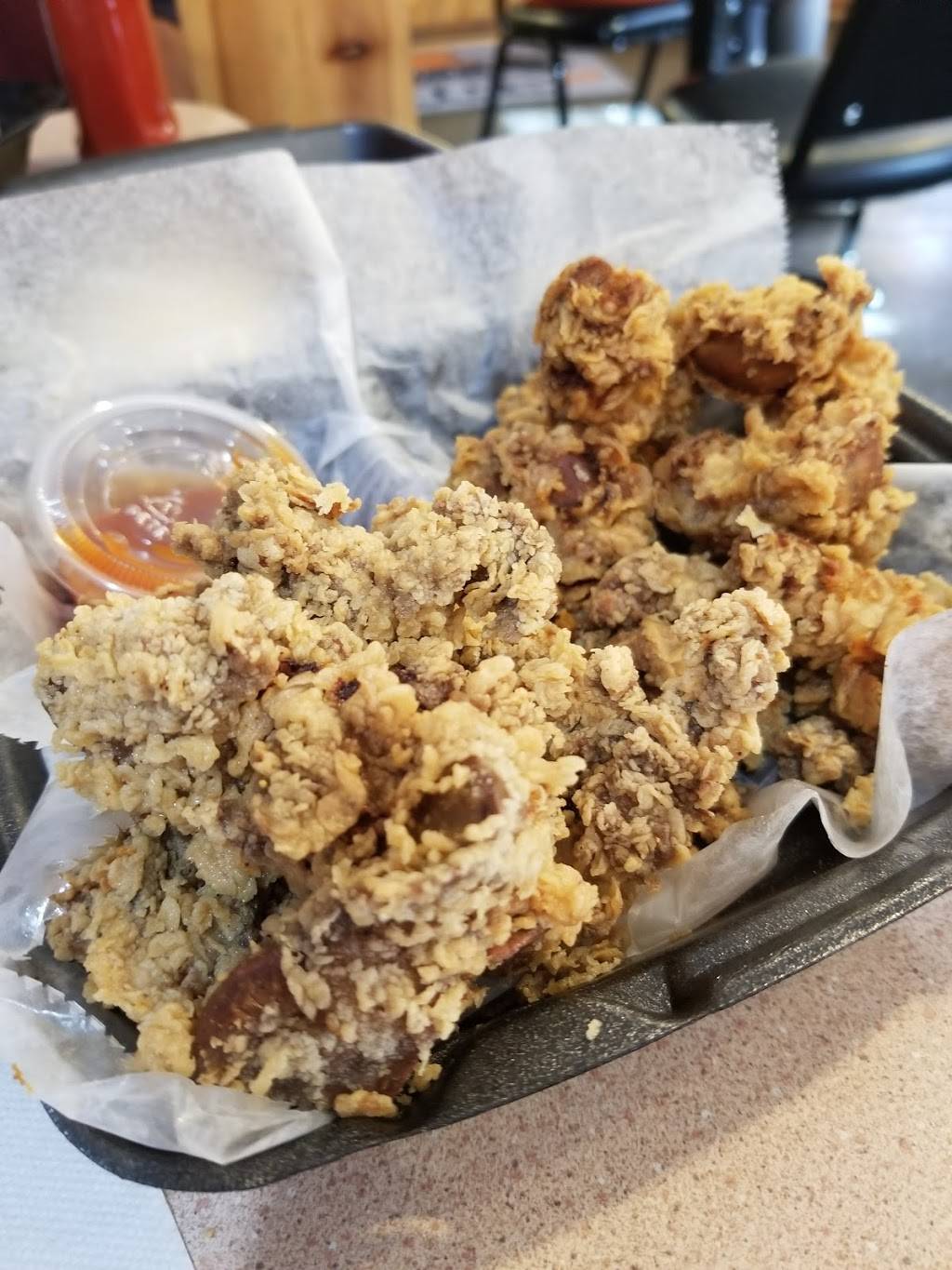 Buck Naked Wings | restaurant | 5912 Blue Pkwy, Kansas City, MO 64129, USA | 8164918037 OR +1 816-491-8037