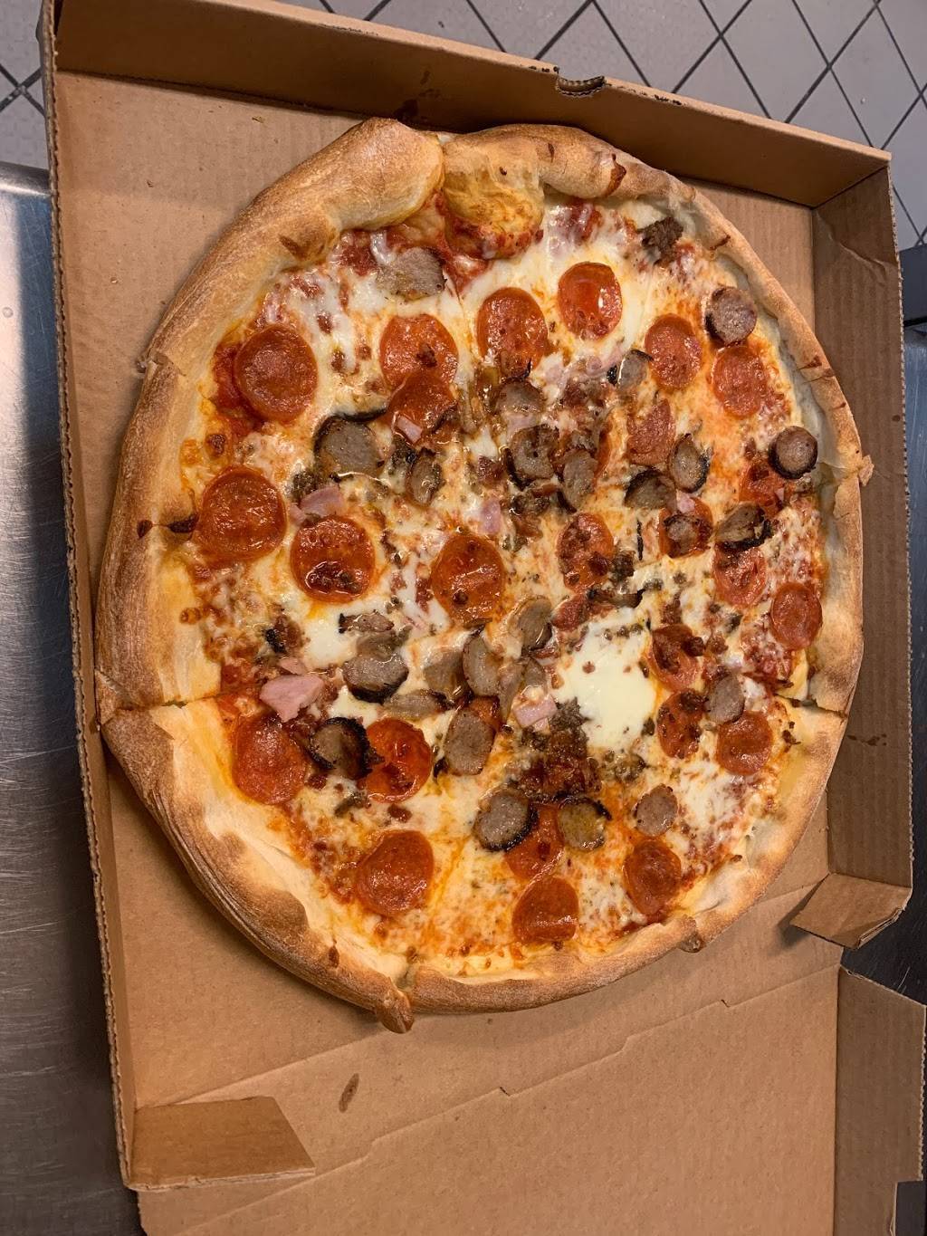 Famous Pizza & Wings | restaurant | 12748 FL-535, Orlando, FL 32821, USA | 4072394000 OR +1 407-239-4000