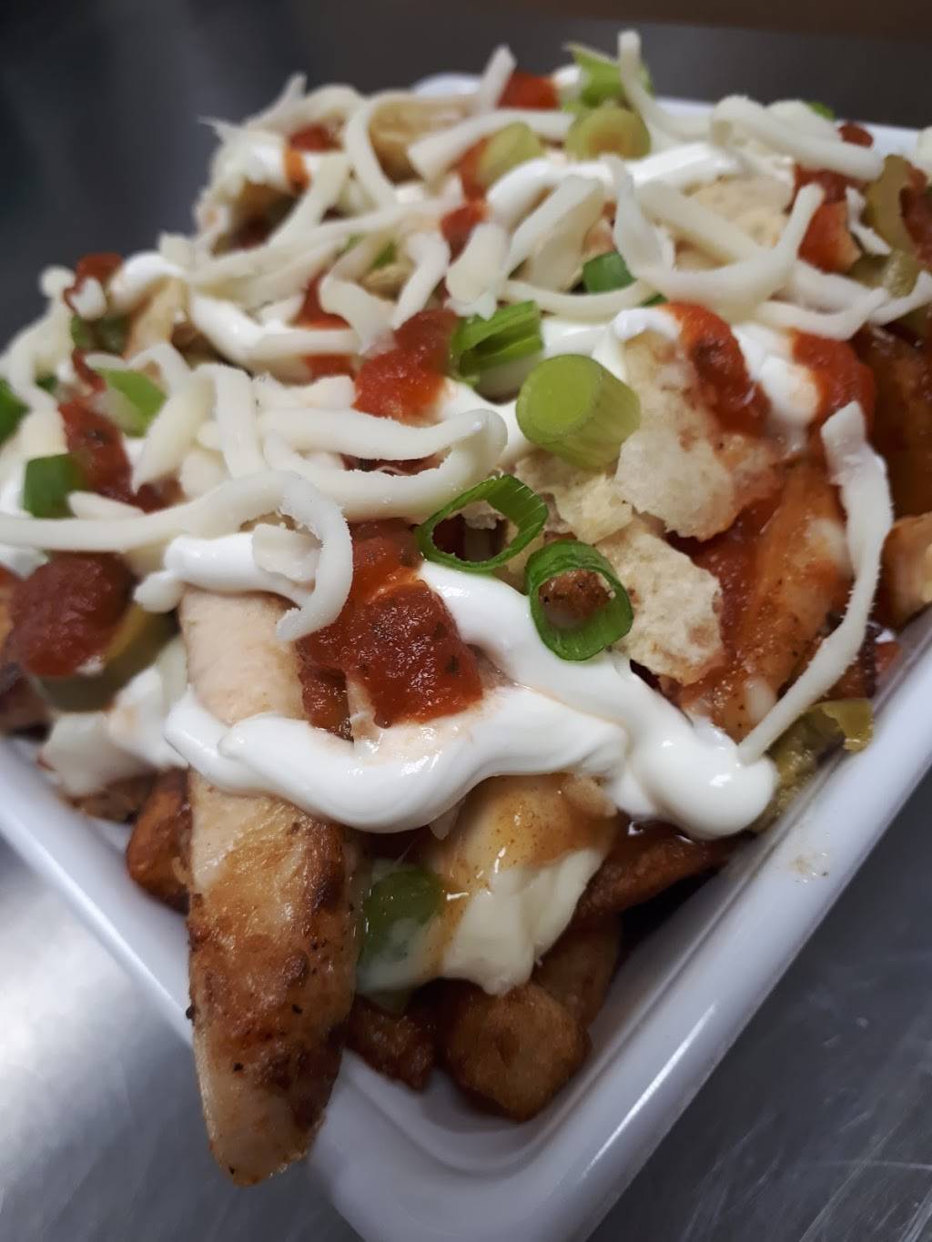 Planète Poutine | restaurant | 140 Rue Robitaille, Granby, QC J2H 0R9, Canada | 4503757557 OR +1 450-375-7557