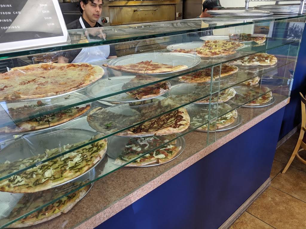 Paulys Pizza Joint | restaurant | 6780 Miramar Rd STE 105, San Diego, CA 92121, USA | 8585668646 OR +1 858-566-8646