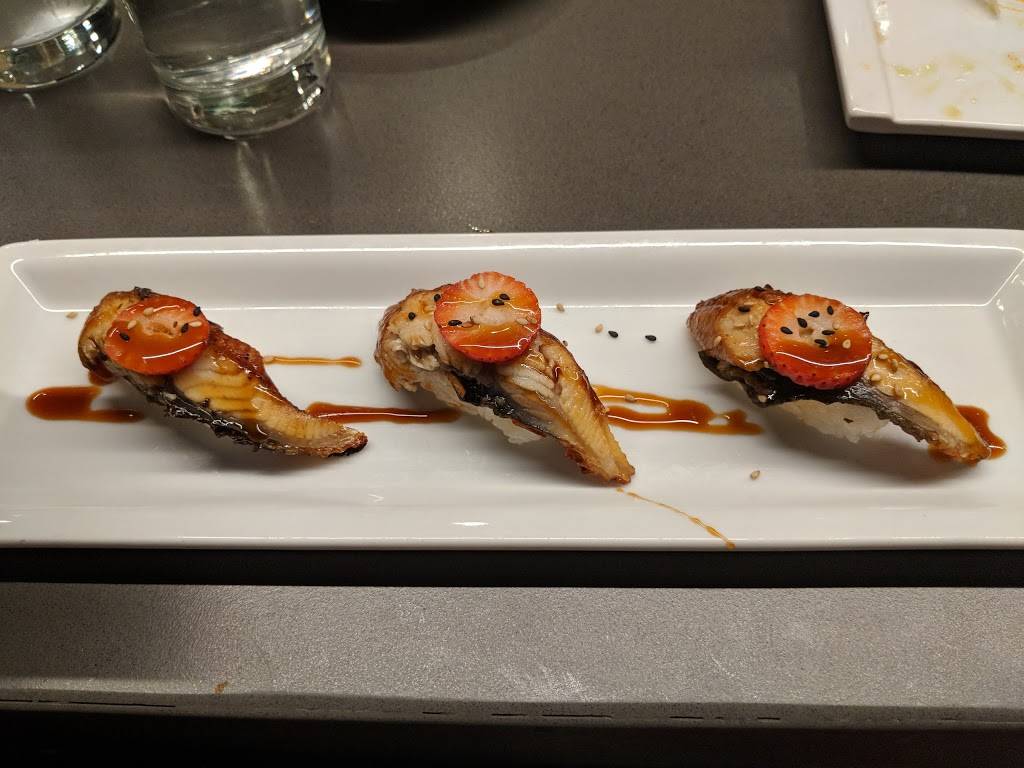 Tsunami Sushi | restaurant | Pan American - 601 Poydras Street Ste B St. Charles & Poydras (enter on, St Charles Ave, New Orleans, LA 70130, USA | 5046083474 OR +1 504-608-3474