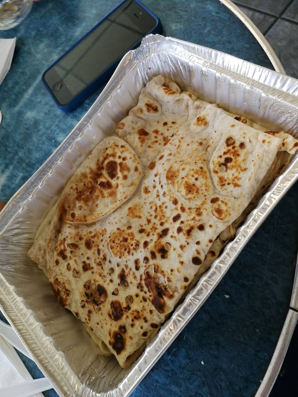 Roti Time | restaurant | 2542 St Clair Ave W, York, ON M6N 1L7, Canada | 4169018311 OR +1 416-901-8311