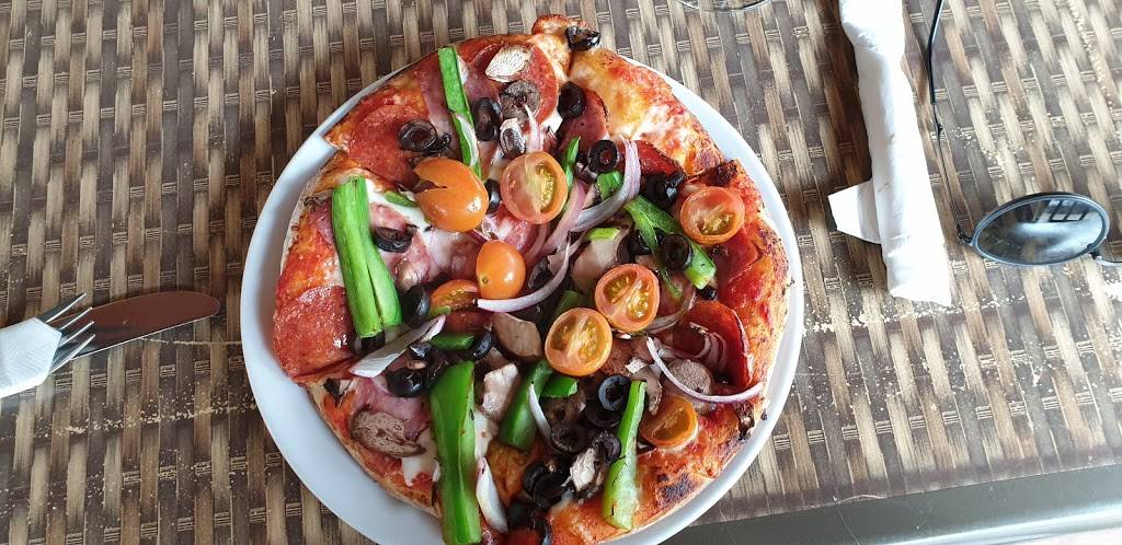 Village Pizza & Grill | restaurant | 403 G St, Davis, CA 95616, USA | 5307500100 OR +1 530-750-0100