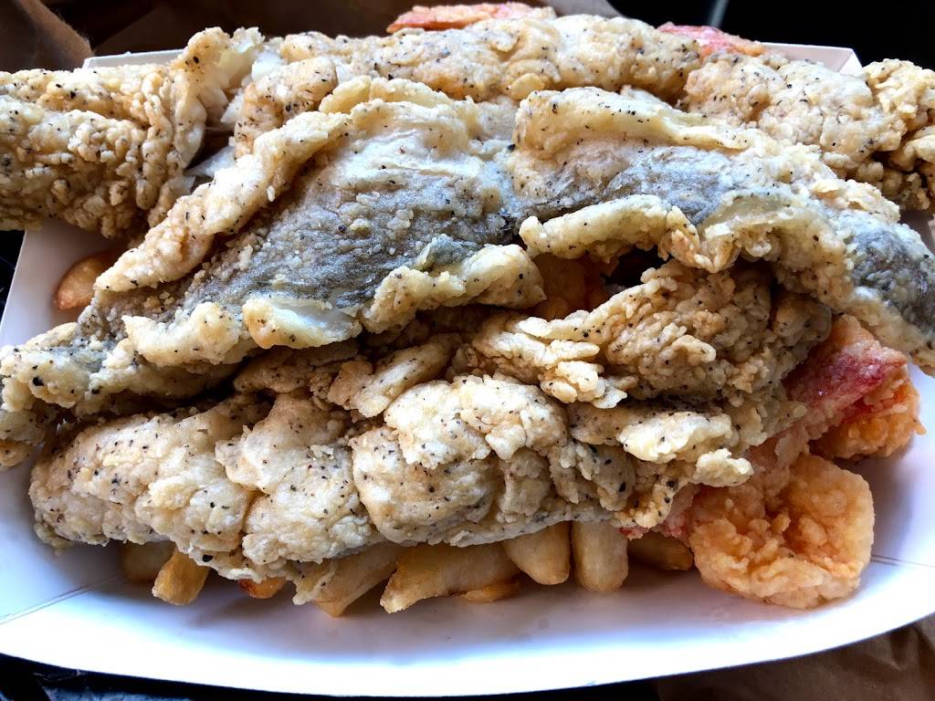 Famous Fish Market | restaurant | 684 St Nicholas Ave, New York, NY 10030, USA | 2124918323 OR +1 212-491-8323