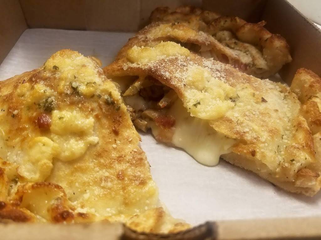 Geppettos Pizza & Ribs | restaurant | 15233 Triskett Rd, Cleveland, OH 44111, USA | 2162522000 OR +1 216-252-2000