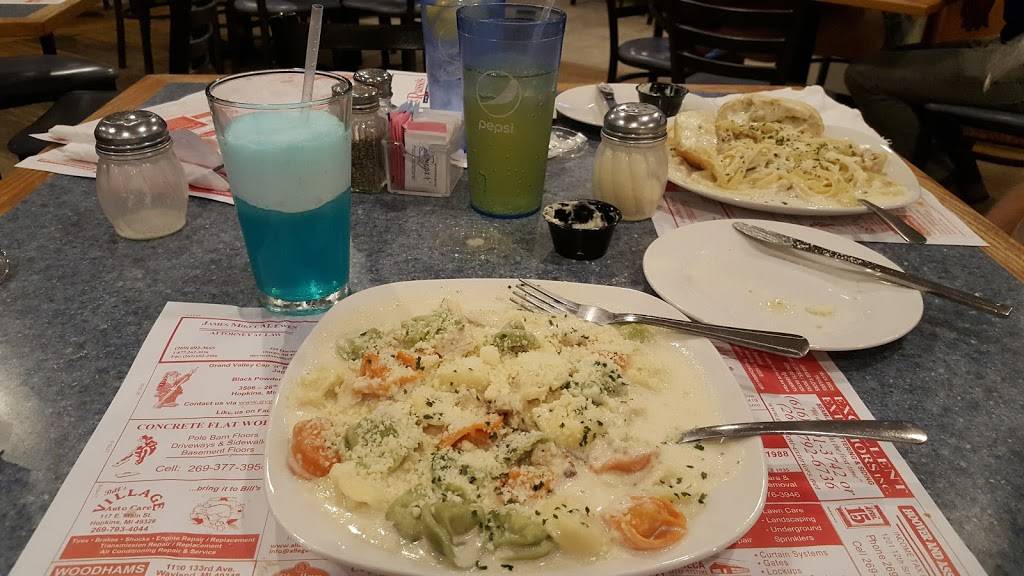 Russos Pizzeria Bar & Grille | restaurant | 100 E Main St, Hopkins, MI 49328, USA | 2697938722 OR +1 269-793-8722