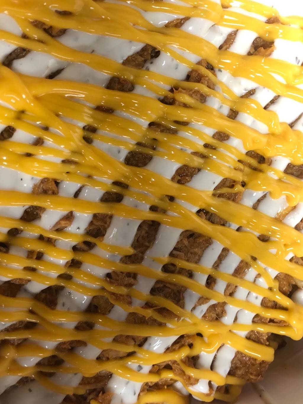 Smokes Poutinerie | restaurant | 4032 Confederation Pkwy, Mississauga, ON L5B 0G4, Canada | 9052322873 OR +1 905-232-2873