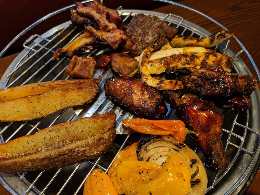 Smokey Bones Bar & Fire Grill | meal takeaway | 1000 WP Ball Blvd, Sanford, FL 32771, USA | 4076888227 OR +1 407-688-8227