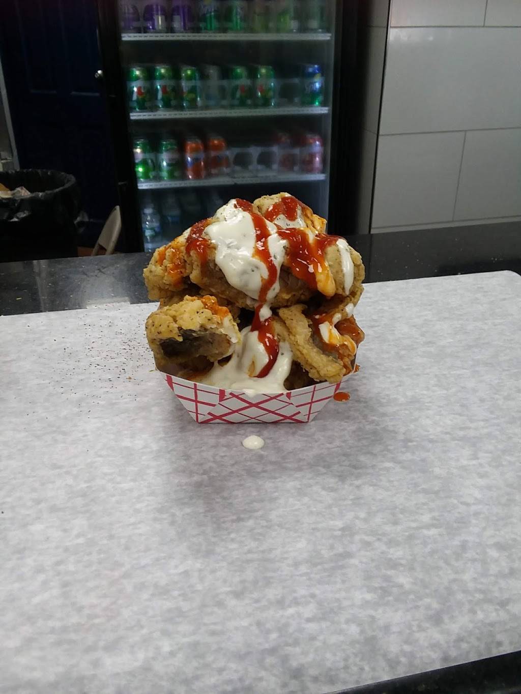 Famous Fish Market | restaurant | 684 St Nicholas Ave, New York, NY 10030, USA | 2124918323 OR +1 212-491-8323