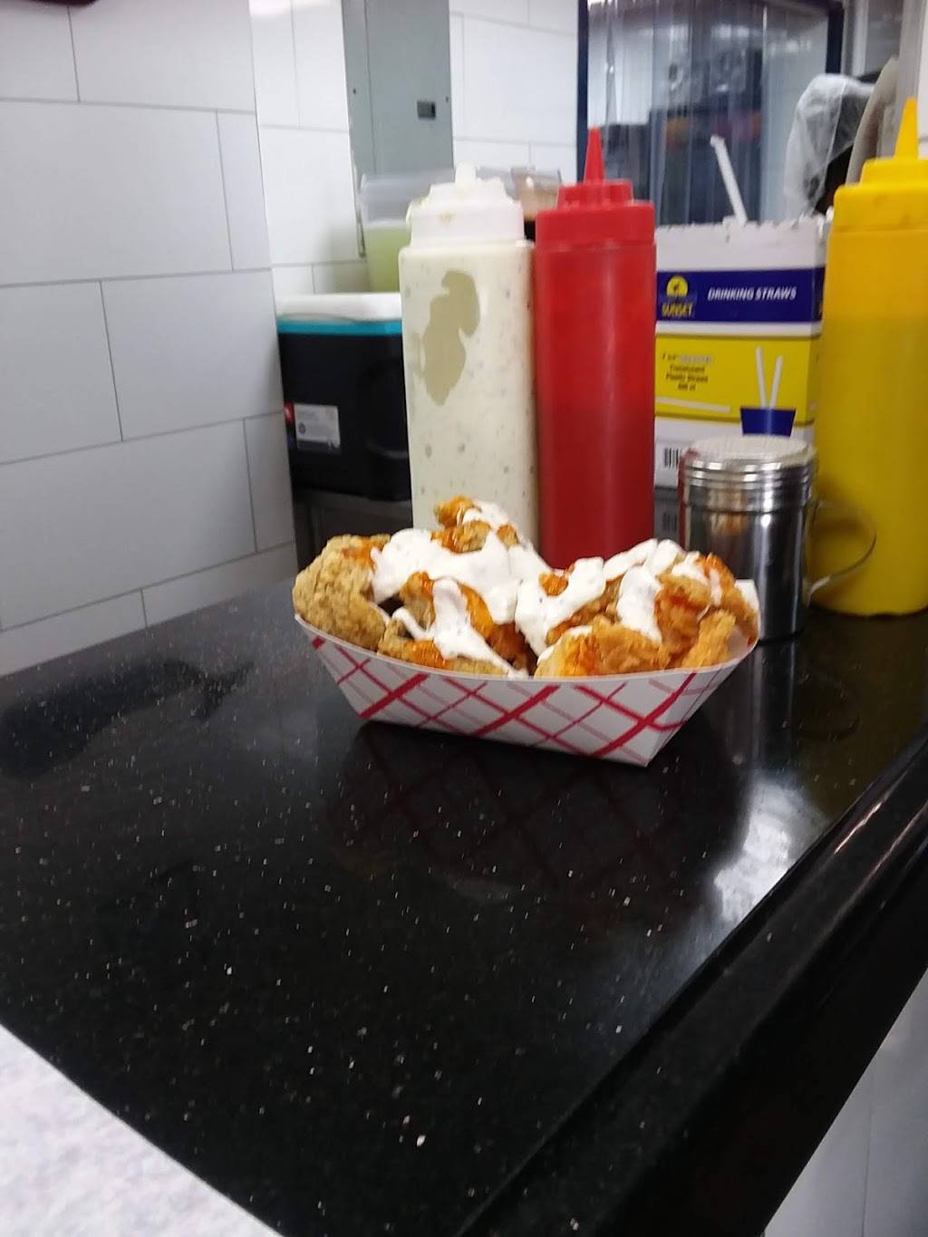 Famous Fish Market | restaurant | 684 St Nicholas Ave, New York, NY 10030, USA | 2124918323 OR +1 212-491-8323