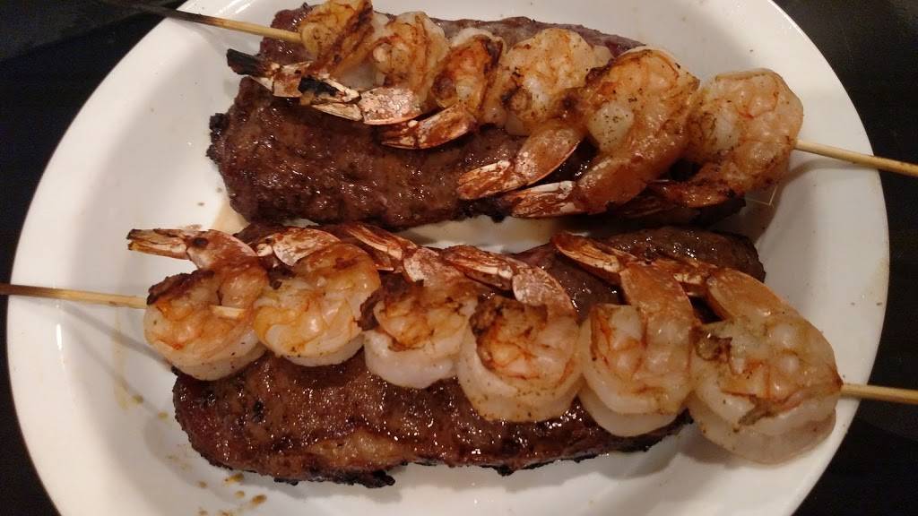 Outback Steakhouse | restaurant | 10045 Gulf Center Dr Suite 125, Fort Myers, FL 33913, USA | 2394330097 OR +1 239-433-0097