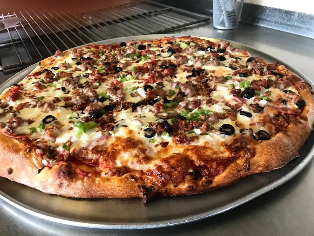 Mineos Pizza | restaurant | 1332 Burton St SE, Grand Rapids, MI 49507, USA | 6164521857 OR +1 616-452-1857