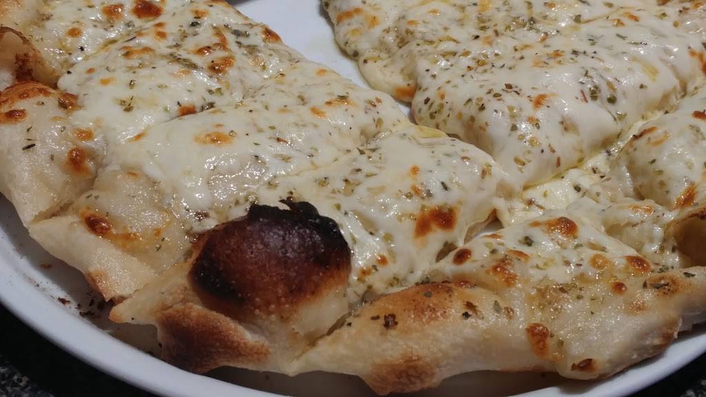 Ricos Pizzeria | restaurant | 972 Hamilton Rd, London, ON N5W 1V6, Canada | 5194559050 OR +1 519-455-9050