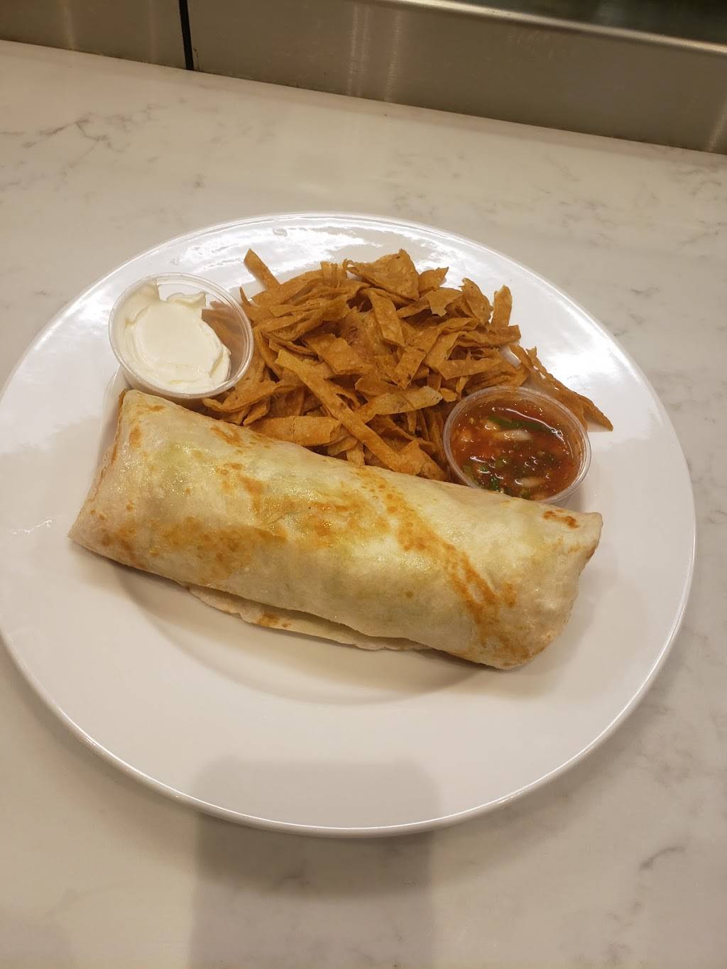 Amigos street tacos | restaurant | 5823 17 Mile Rd, Sterling Heights, MI 48310, USA | 3134299090 OR +1 313-429-9090