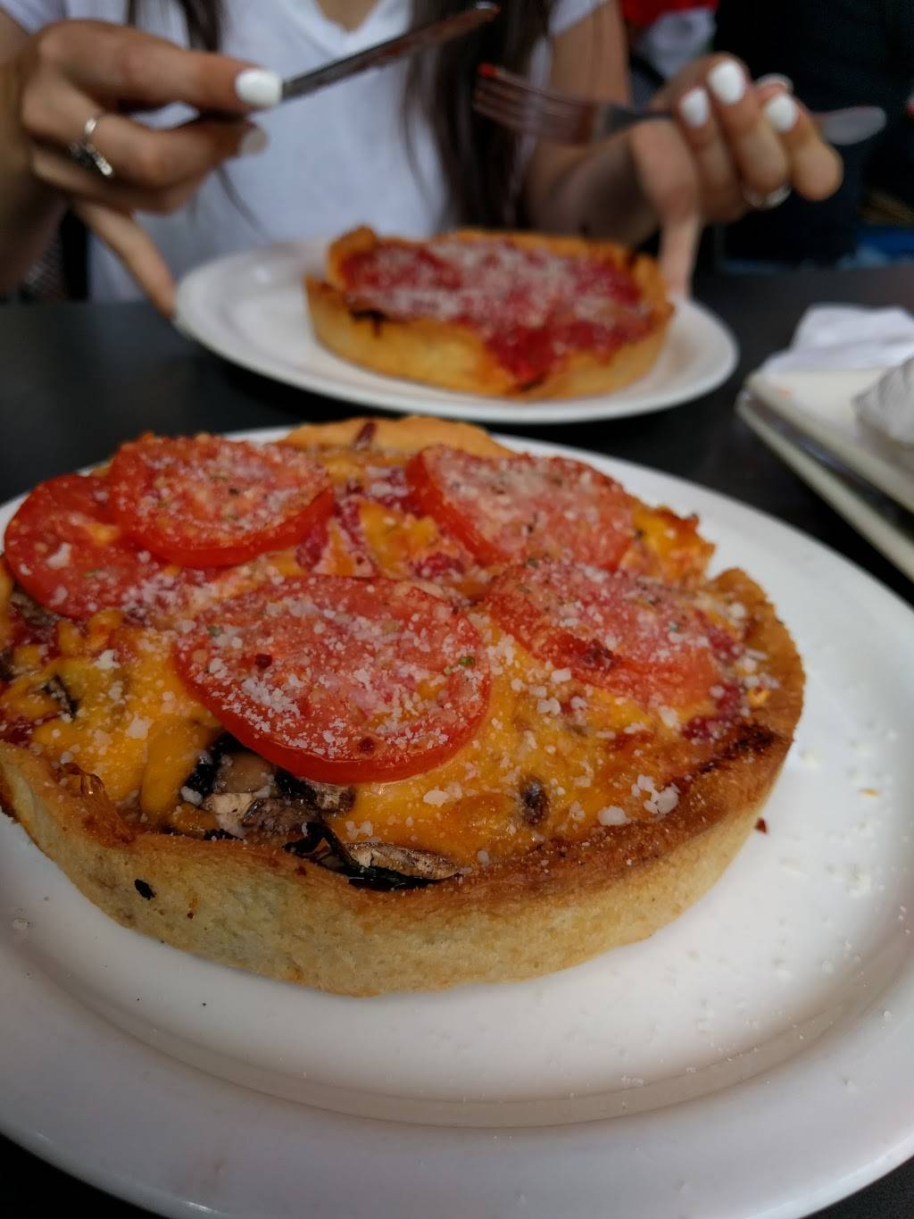 Lou Malnatis Pizzeria | meal delivery | 1120 N State St, Chicago, IL 60610, USA | 3127257777 OR +1 312-725-7777